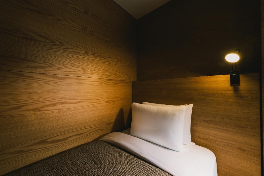Nest Hotel Інчхон Екстер'єр фото A capsule hotel room in Tokyo